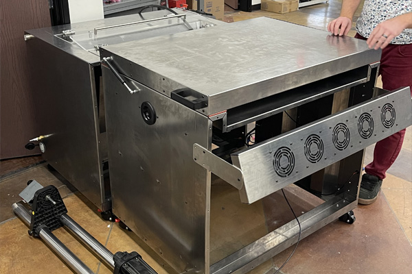 Raw Super Shaker frame under preliminary assembly and quality testing