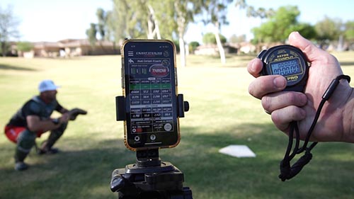 Matt Ceriani conducting real-time accuracy testing with the Caught Stealing Pro100™️ against a stopwatch