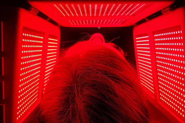 Red LED light therapy session using the Lightwave Deluxe ELITE system