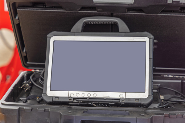 Rugged tablet device designed for harsh environments, featuring durable housing and waterproof design.